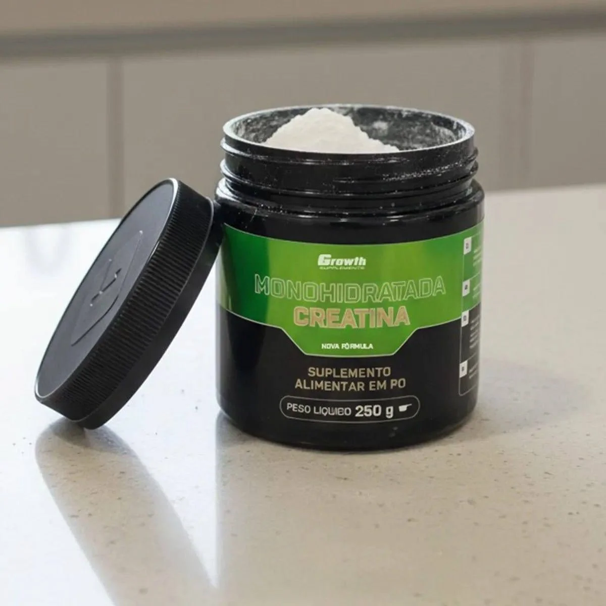 Pote aberto de Creatina Monohidratada Growth Supplements 250g em pó