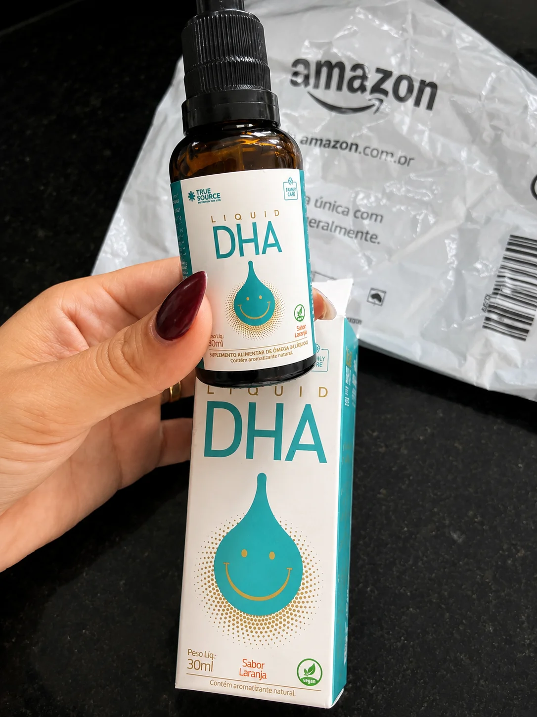 Foto real do True Source DHA Liquid sabor laranja tirada das avaliações da Amazon